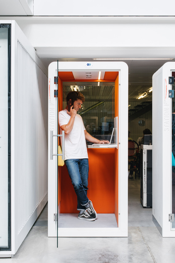 station f, phone booth, opened door, white metal, containers, architecture, concrete, white t-shirt, phonecall