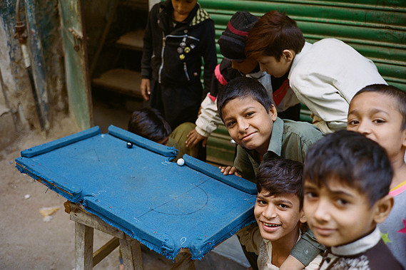 karachi, children, street, pool table, makeshift, blue, laughter