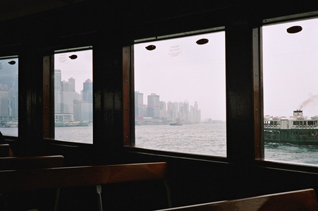 ferry, sea, windows, wooden chairs, central, buildings, boat, water, white sky, hong-kong