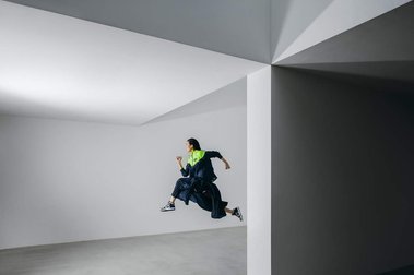 jumping forward, blue dress, laceless sneakers, yellow details, asian model, geometry, architecture, fashion