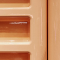 rounded shelves covered in glossy skin color plastic.