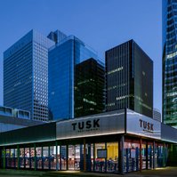 empty restaurant in front of skyscrapers in the Paris business district La Defense