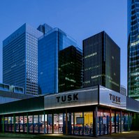 empty restaurant in front of skyscrapers in the Paris business district La Defense