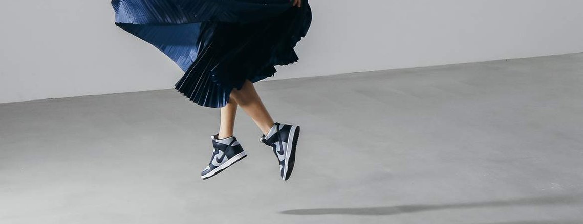 sneakers, nike, movement, sacai, japan, jumping model, editorial, studio lighting, white walls, concrete floor