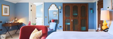 A bright and airy hotel room. 