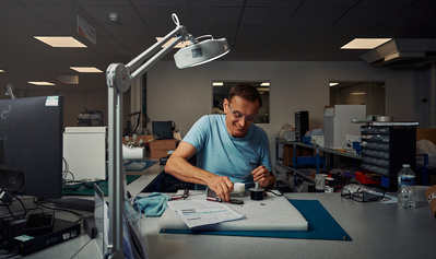 A cinematic portrait of a scientist working in a lab. 