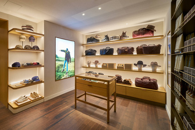 a store with shelves filled with hats and other items