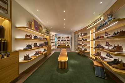 a store with shelves filled with hats and other items