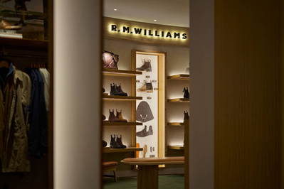 A wall of shoes in a shoe shop. 