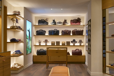 a store with shelves filled with hats and other items