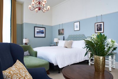 A bright and airy hotel room. 