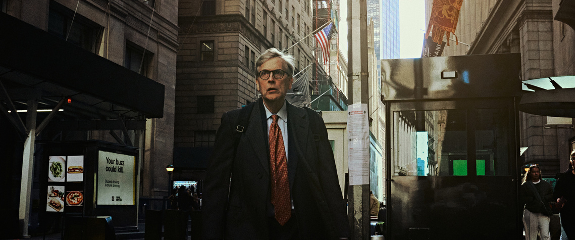 A New York city businessman walking the streets. 