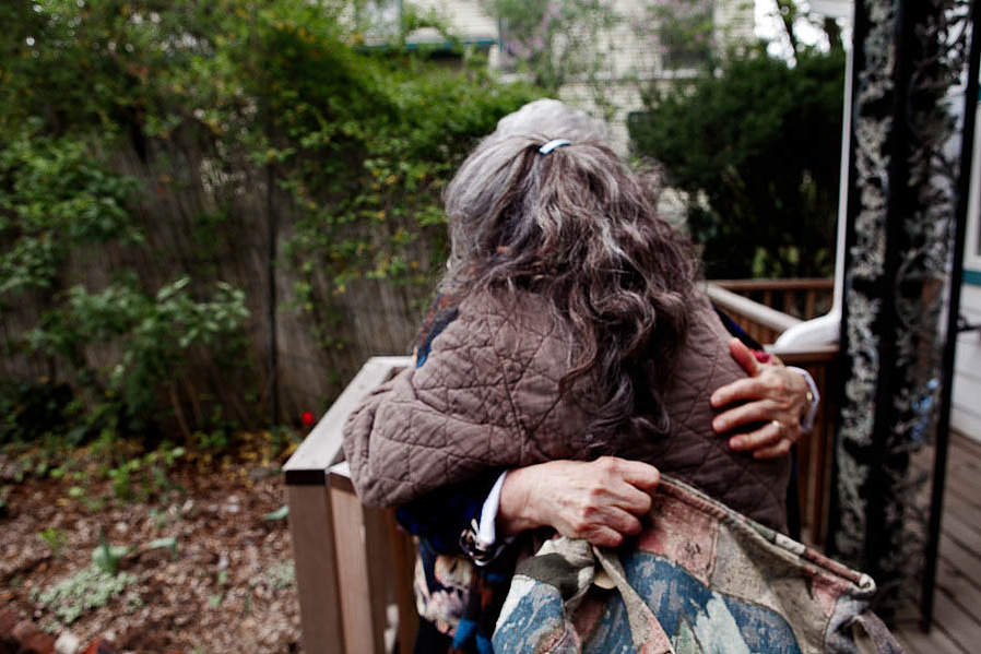 Lucy huguing her mother Milly Mahler as soon as she got in Woodstock to visit and stay with her 93 years old mother. Woodstock , Upstate NY, Spring/ 2012