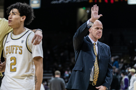 Tad Boyle waves to the cheering student section at the end of the successful game against the Washington Huskies on Sunday, Jan. 9th, 2022. (Io Hartman&#x2F;CU Independent)