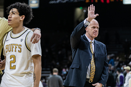 Tad Boyle waves to the cheering student section at the end of the successful game against the Washington Huskies on Sunday, Jan. 9th, 2022. (Io Hartman&#x2F;CU Independent)