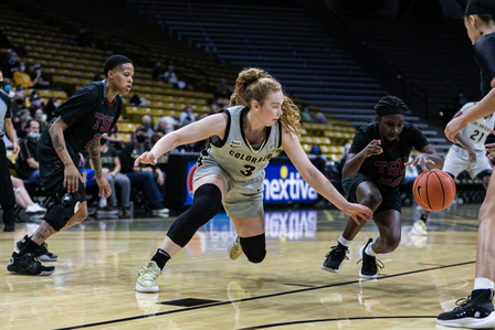 Sophomore guard Frida Foreman (3) lunges for the ball while playing against TSU at the game on Tuesday, Nov. 23, 2021. (Io Hartman&#x2F;CU Independent)