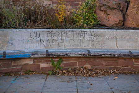 The words &amp;amp;quot;CU perpetuates rape culture,&amp;amp;quot; are written in chalk on the side of the Broadway and University Hill underpass on Thursday, November 4th, 2021. (Io Hartman&amp;amp;#x2F;CU Independent)