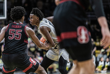 Sophomore forward Jabari Walker (12) controls the ball while playing against Standford at the game on Sunday, Nov. 28th, 2021. (Io Hartman&#x2F;CU Independent)