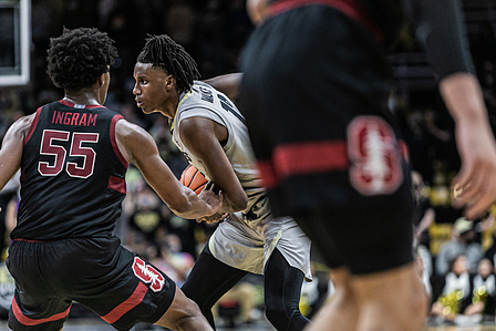Sophomore forward Jabari Walker (12) controls the ball while playing against Standford at the game on Sunday, Nov. 28th, 2021. (Io Hartman&#x2F;CU Independent)