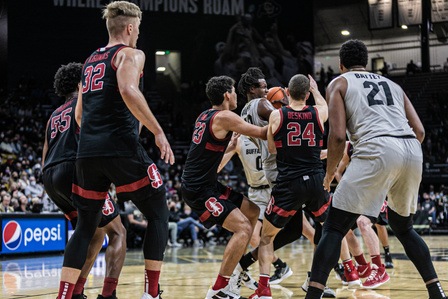 Sophomore forward Jabari Walker (12) protects the ball against Standford at the game on Sunday, Nov. 28th, 2021. (Io Hartman&#x2F;CU Independent)