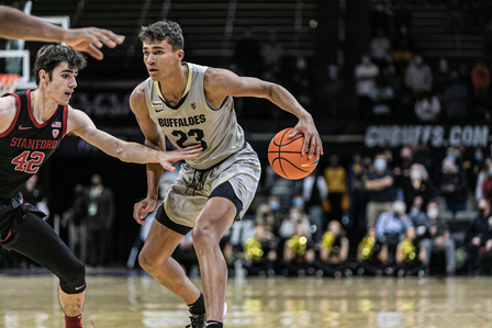 Sophomore forward Tristan Da Silva guards the ball against a Stanford player during the game at the CU Events Center. on Sunday, Nov. 28th, 2021. (Io Hartman&#x2F;CU Independent)