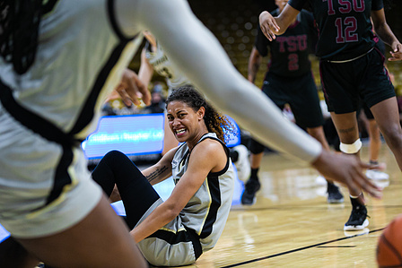 Senior guard Tatyanna Jones (1) falls during the game against TSU at the CU Events Center on Tuesday, Nov. 23rd, 2021. (Io Hartman&#x2F;CU Independent)
