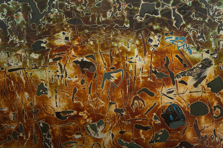 Discover the magic of this symbolic semi-abstract painting depicting a lotus pond full of lotus leaves and grasses. Painted with natural lacquer, silver leaf and pigments in rich orangy golden tones with contrasting deep greens.