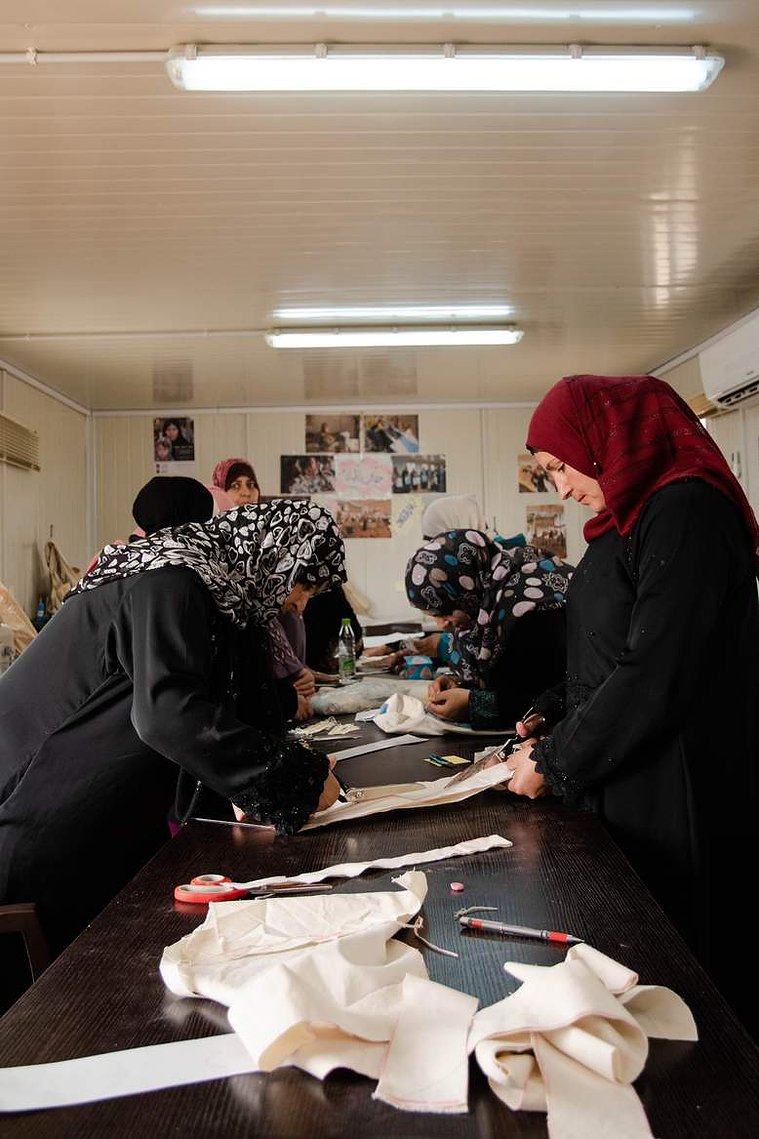 The Lel-Haya workers form a production line when producing big tote bag orders to help with time and efficiency in crafting the handmade goods. 
