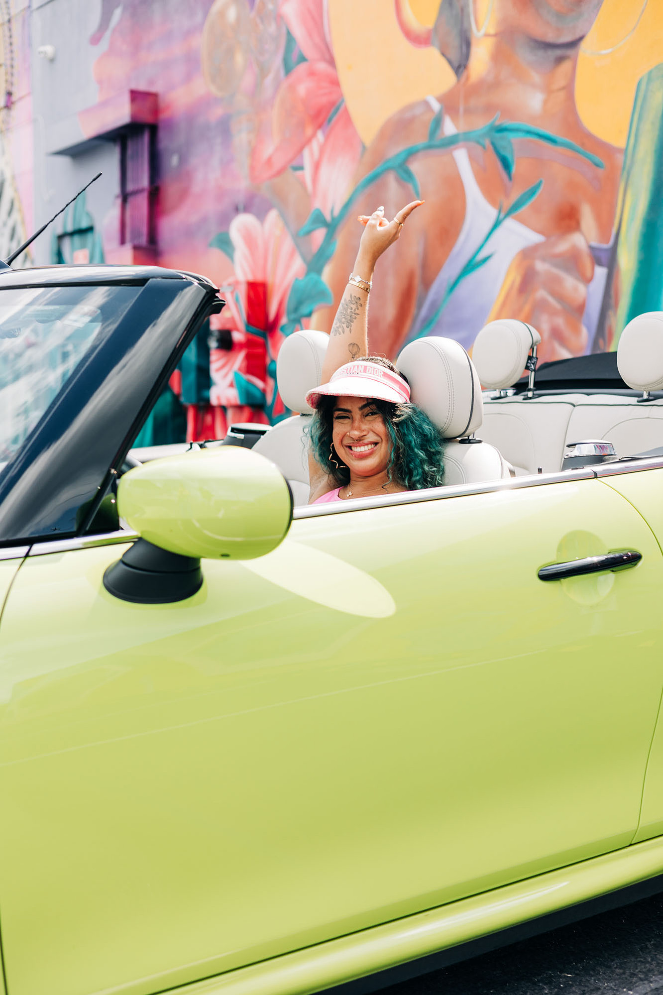 miami photoshoot at wynwood walls with colorful mural and lime green mini cooper car and fashion model barbie theme photoshoot 