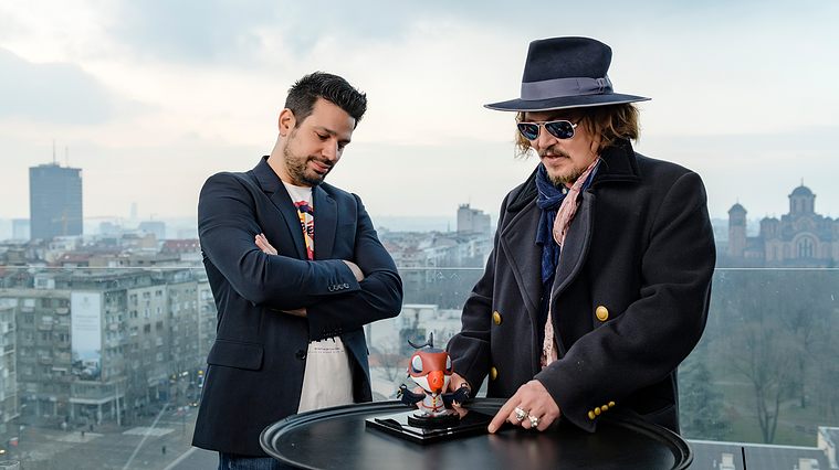 Johnny Depp and I admiring his inspired Puffins Impossible star, Johnny Puff
