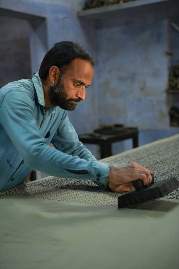 In one of the block maker studios in Bagru, India, a master artisan is immersed in the local tradition of woodblock printing.