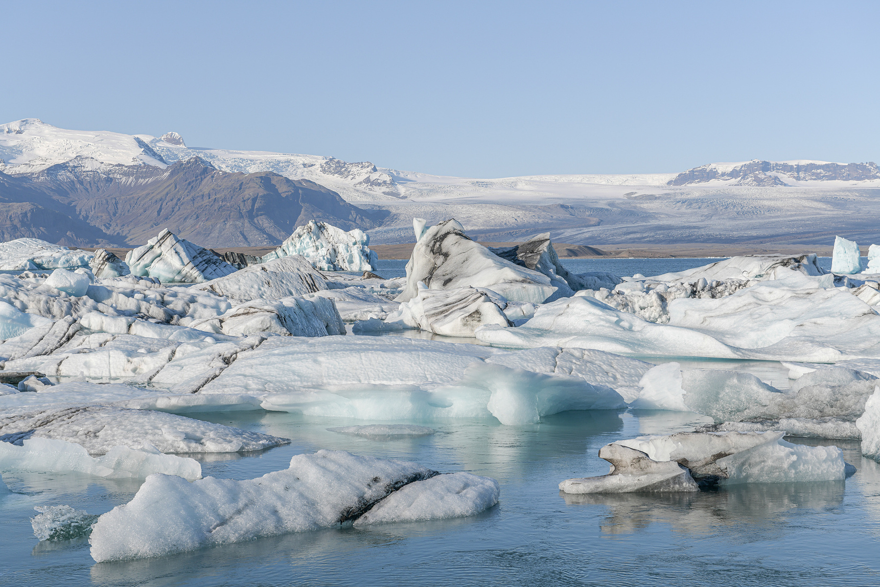 Jökulsárlón Glacier Lagoon. Blocks of ice break off Breiðamerkurjökull, a glacier on the south side of Vatnajökull. Blocks of ice, in various shapes and sizes, can be seen floating on the lagoon: the lagoon is 250 meters deep, the deepest lake in Iceland.