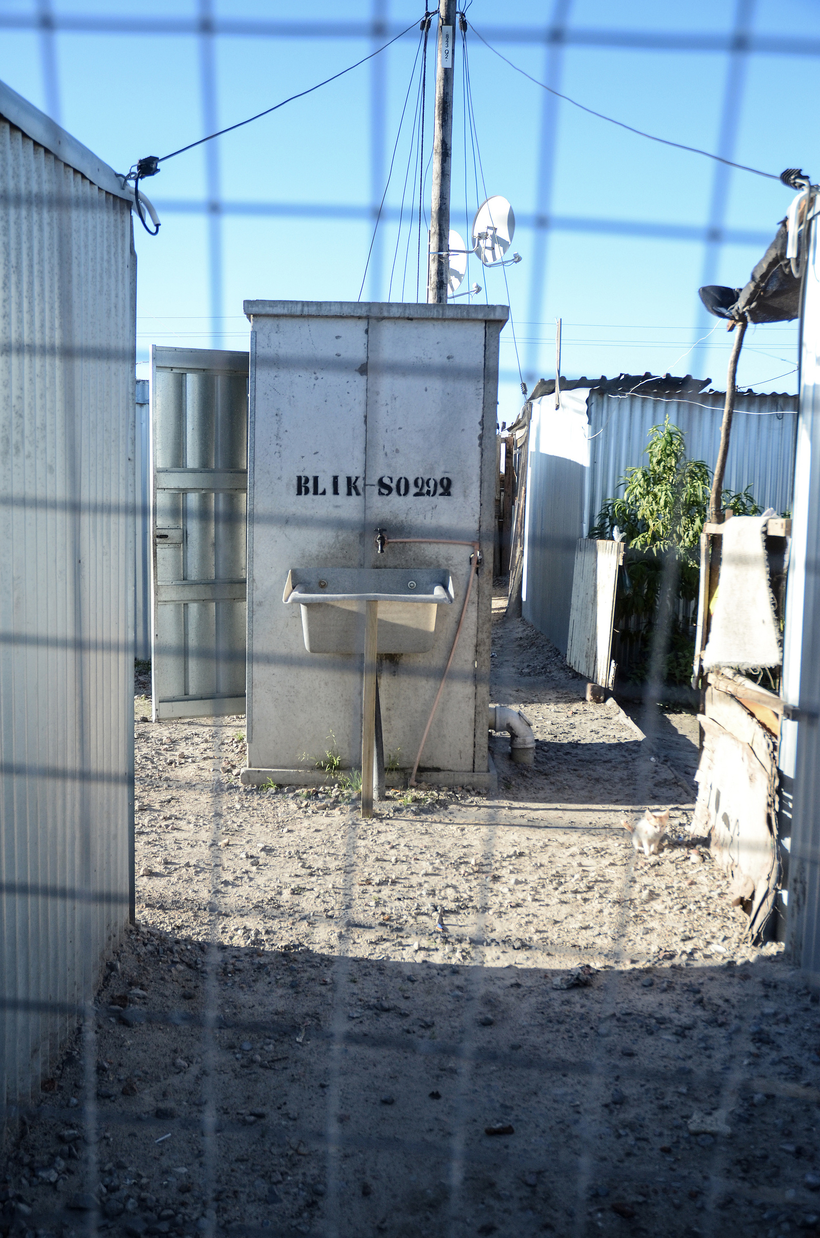photojournalism, photojournalist, news photograph, news, Africa, South Africa, Cape Town, Blikkiesdorp, informal settlement, township