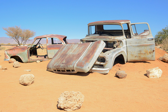 Rusted old cars at Solitaire, a small rural settlement in the Khomas Region of central Namibia. This small village can be found near the Namib-Naukluft National Park. Elements of Nature Curation, by photographer Lizane Louw.