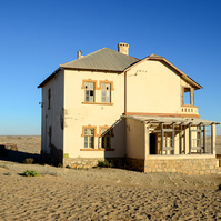 "Portraits of Time" Fine Art Photography Collection. Kolmanskop, Namibia. A work from the collection created at Kolmanskop by photographer, Lizane Louw. An image of an abandoned building in the diamond mining village in the Namib.