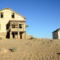 "Portraits of Time" Fine Art Photography Collection. Kolmanskop, Namibia. A work from the collection created at Kolmanskop by photographer, Lizane Louw. An image of an abandoned building in the diamond mining village in the Namib.