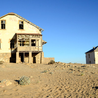"Portraits of Time" Fine Art Photography Collection. Kolmanskop, Namibia. A work from the collection created at Kolmanskop by photographer, Lizane Louw. An image of an abandoned building in the diamond mining village in the Namib.
