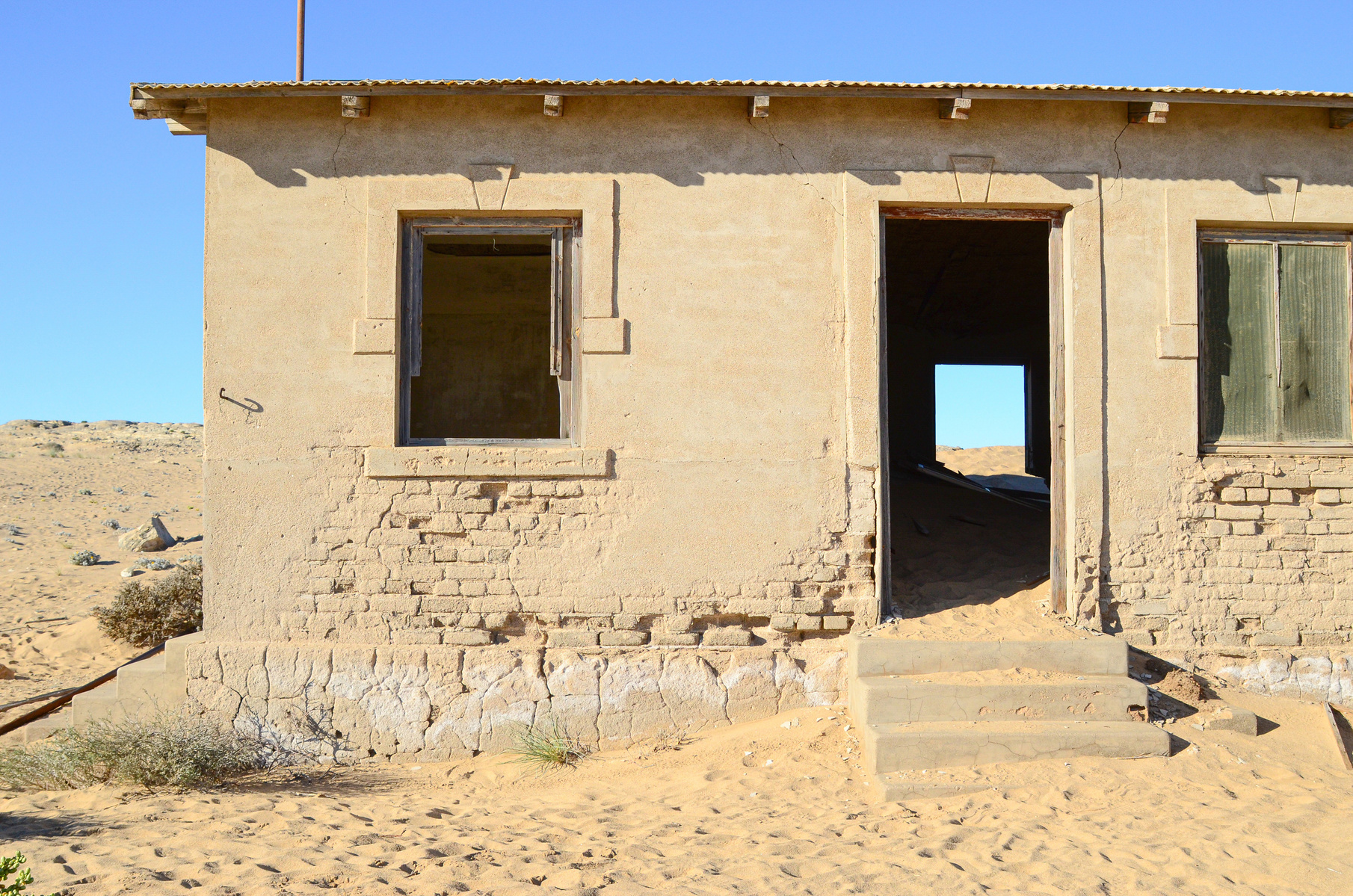 "Portraits of Time" Fine Art Photography Collection. Kolmanskop, Namibia. A work from the collection created at Kolmanskop by photographer, Lizane Louw. An image of an abandoned building in the diamond mining village in the Namib.