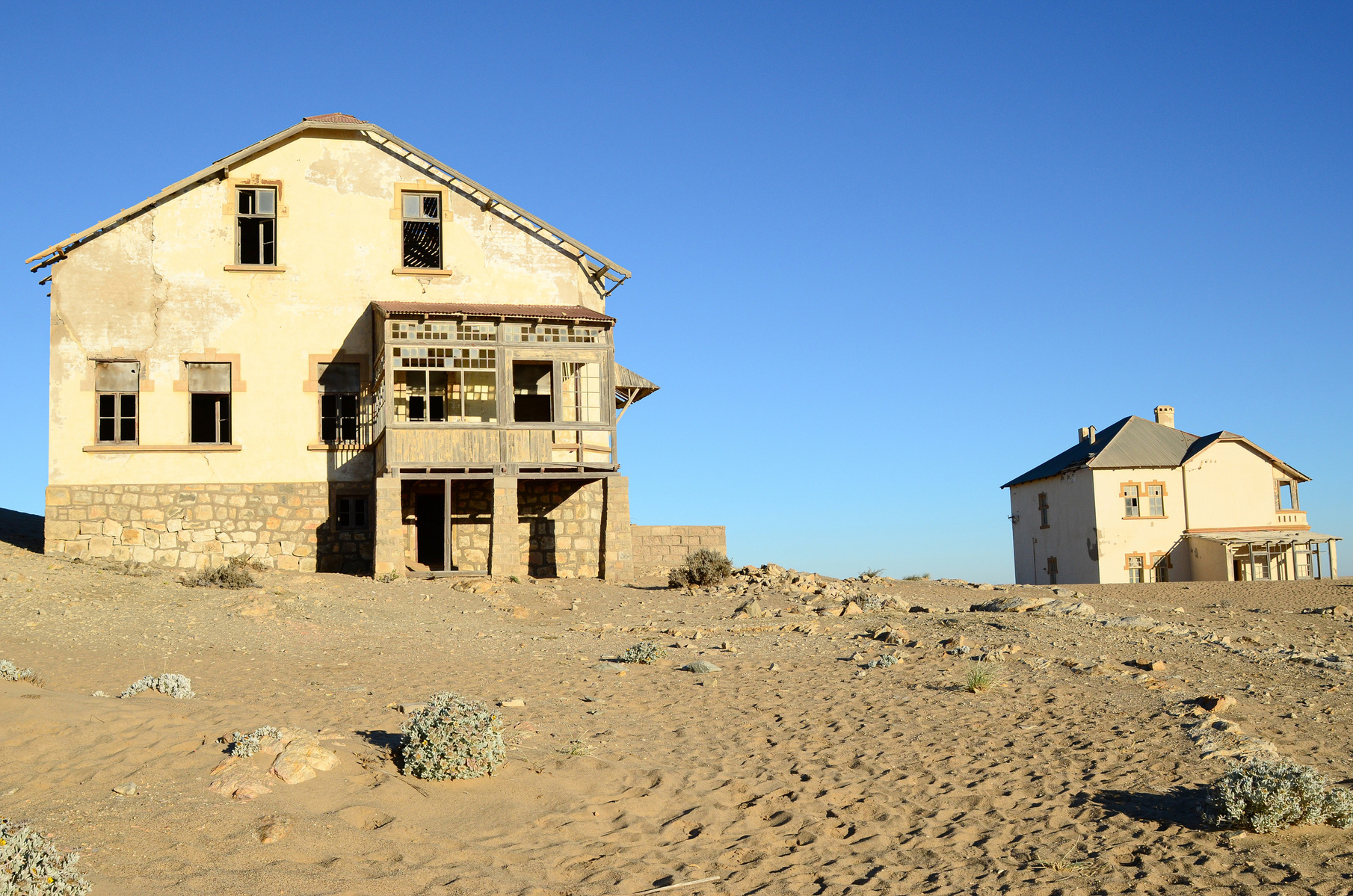"Portraits of Time" Fine Art Photography Collection. Kolmanskop, Namibia. A work from the collection created at Kolmanskop by photographer, Lizane Louw. An image of an abandoned building in the diamond mining village in the Namib.