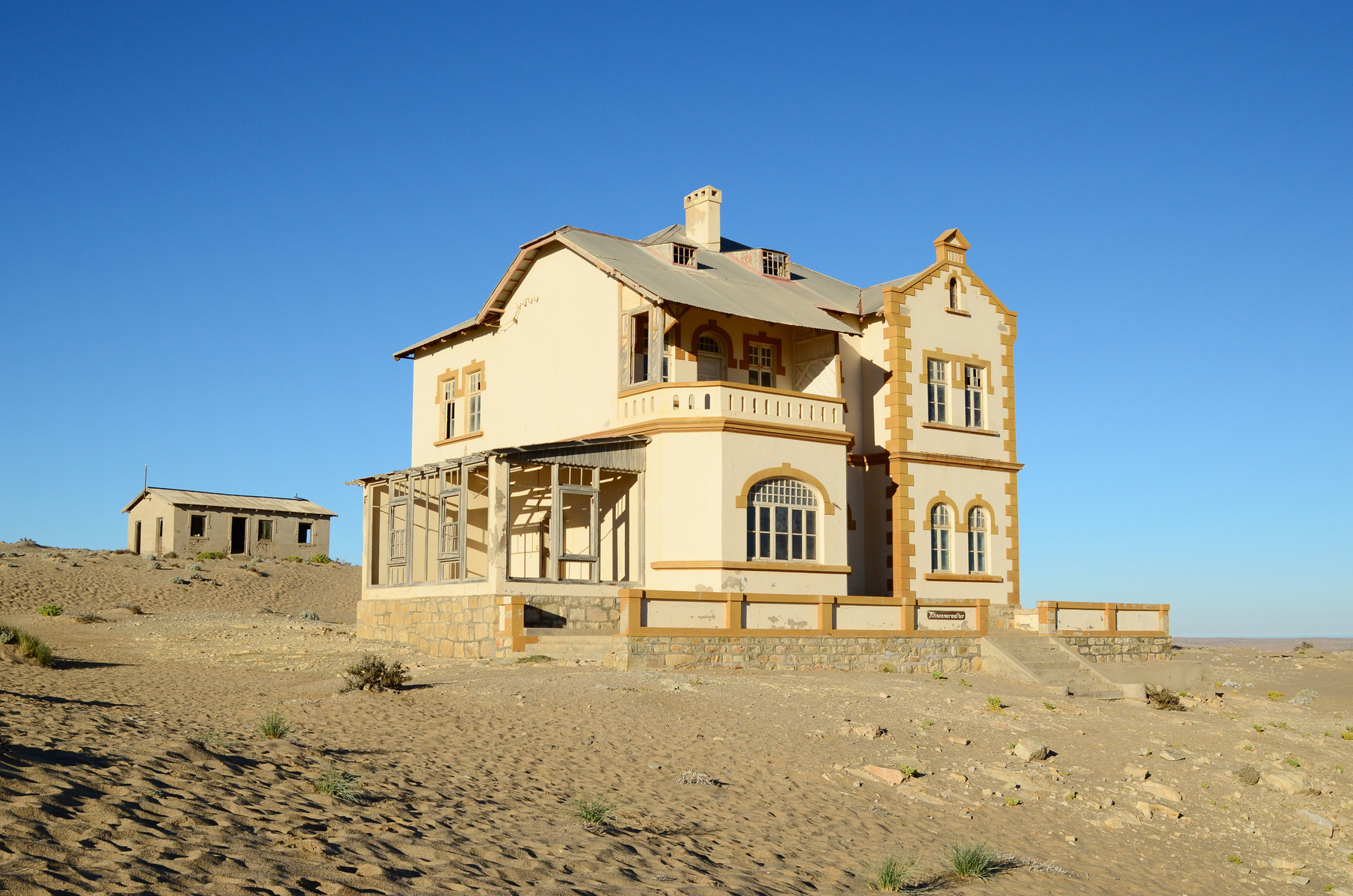 "Portraits of Time" Fine Art Photography Collection. Kolmanskop, Namibia. A work from the collection created at Kolmanskop by photographer, Lizane Louw. An image of an abandoned building in the diamond mining village in the Namib.