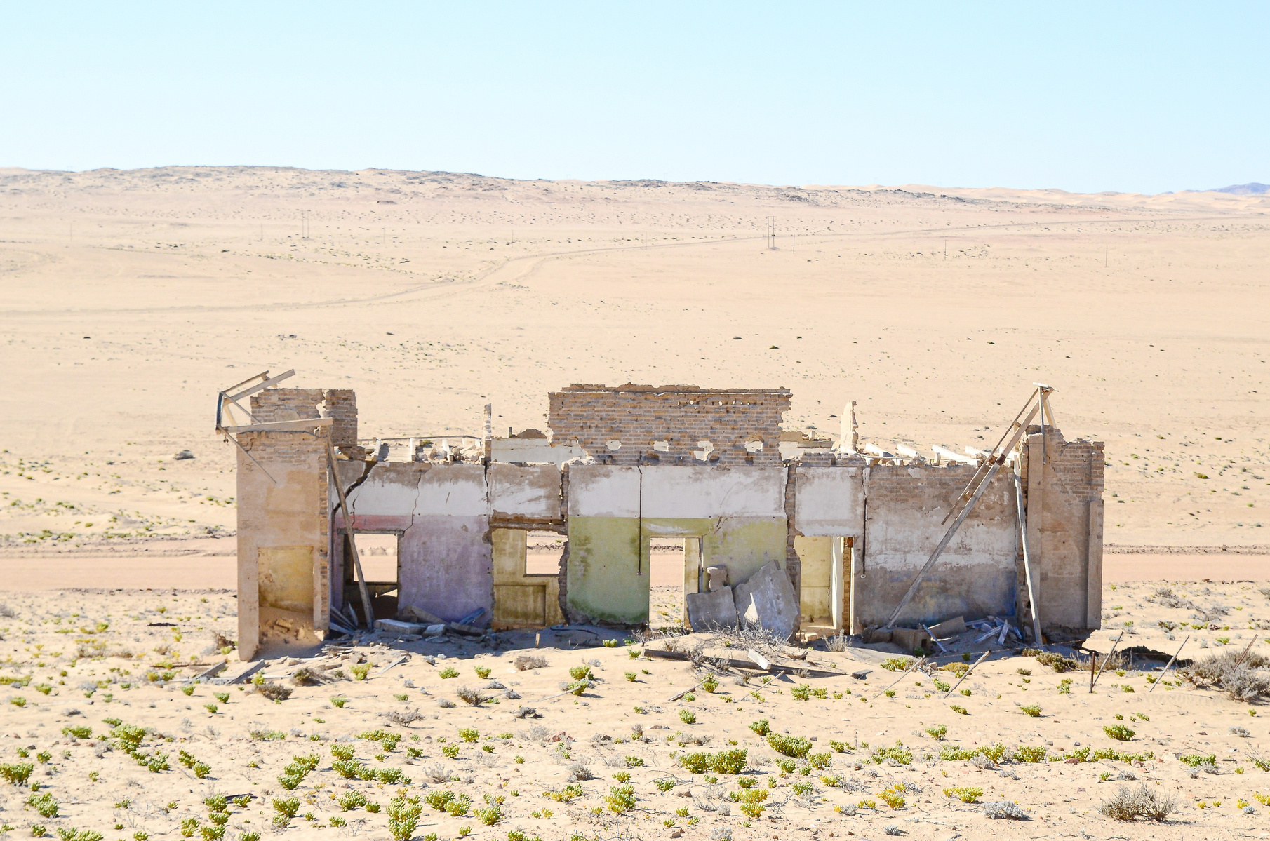 "Portraits of Time" Fine Art Photography Collection. Kolmanskop, Namibia. A work from the collection created at Kolmanskop by photographer, Lizane Louw. An image of an abandoned building in the diamond mining village in the Namib.