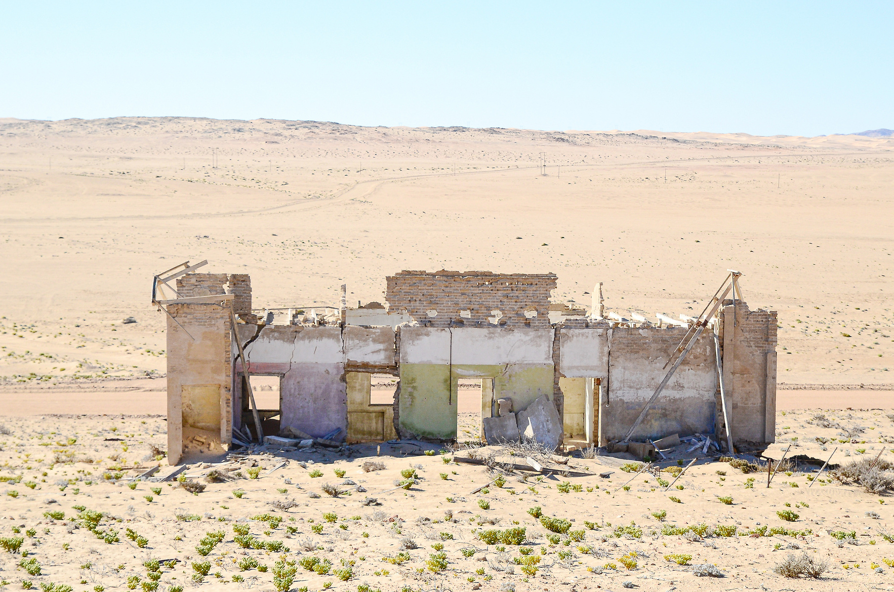 "Portraits of Time" Fine Art Photography Collection. Kolmanskop, Namibia. A work from the collection created at Kolmanskop by photographer, Lizane Louw. An image of an abandoned building in the diamond mining village in the Namib.