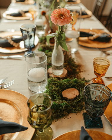 Moss wedding decorations on table