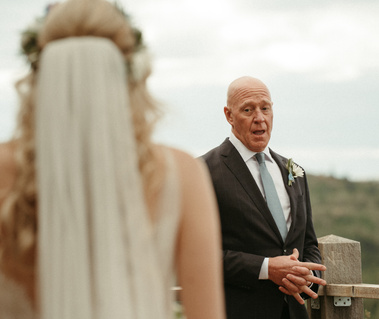 Father turning around to see his Daughter on her wedding day.