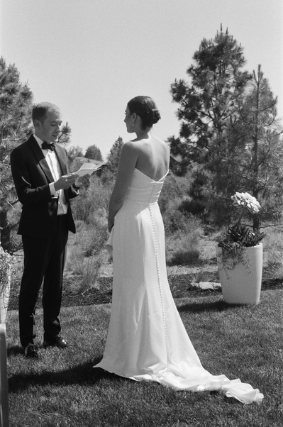 Reading vows to each other during Bend Oregon wedding