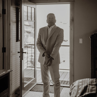 photo of groom getting ready at Brasada Ranch during their wedding in Bend Oregon