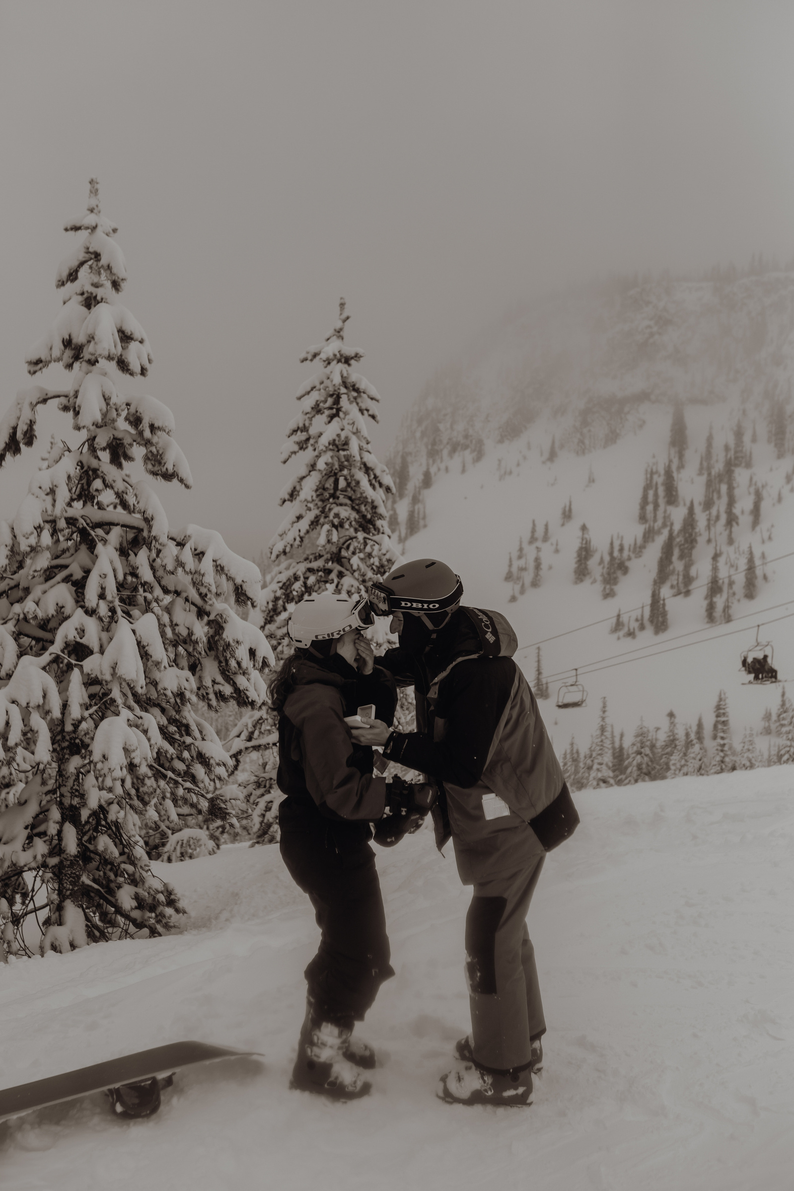 Hoodoo Ski Resort proposal photos while skiing and snowboarding during a snowstorm