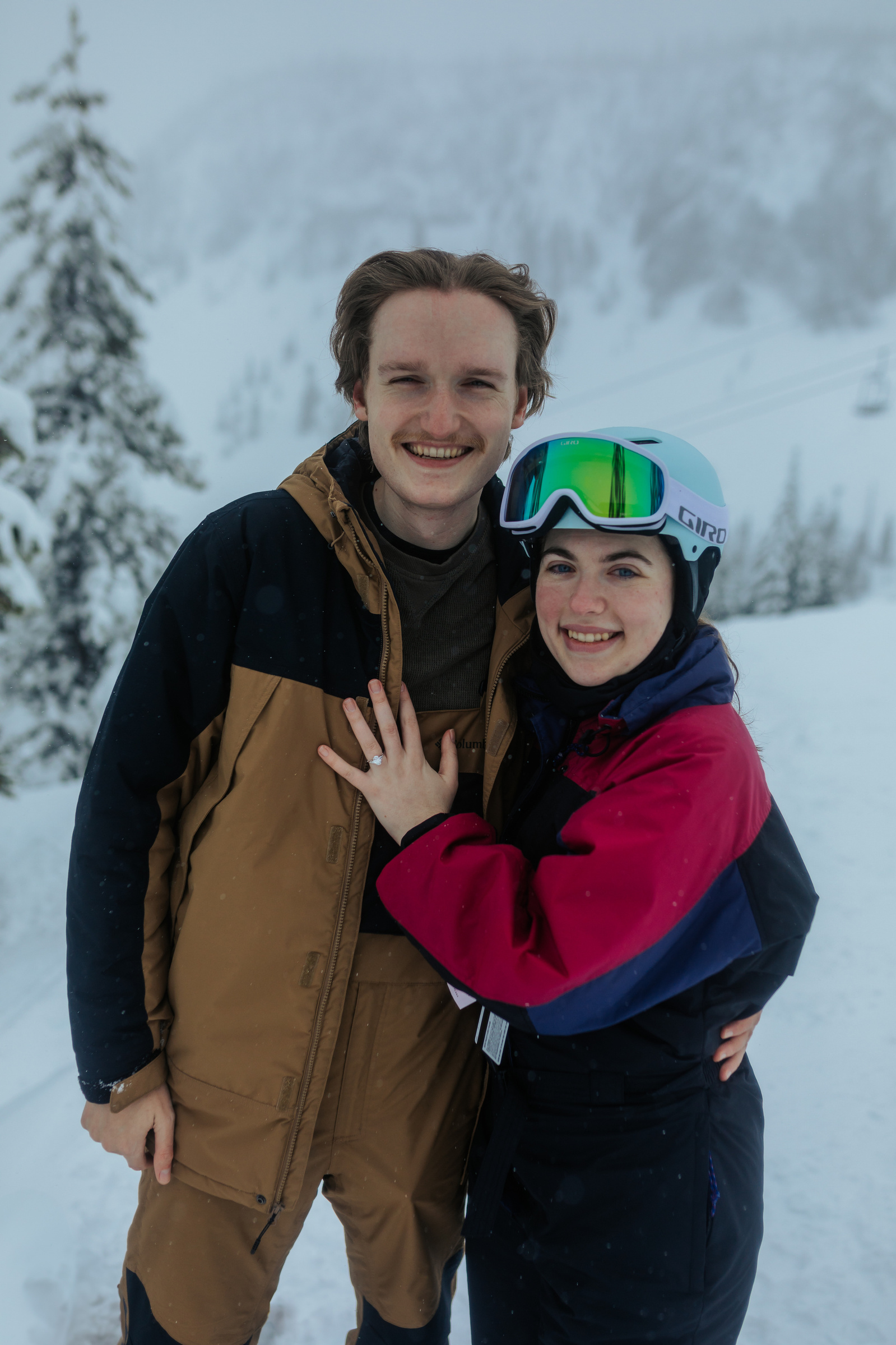 engagement session ring photo at Hoodoo Ski Resort in Central Oregon during a snowstorm