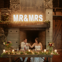 Bride and groom cheers at their Brasada Ranch wedding in Bend Oregon
