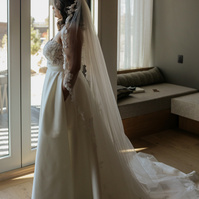 Bride looking out at the cascade mountains at her Brasada Ranch wedding